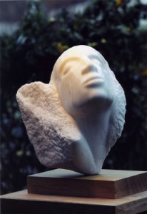 sculpture du visage d'une femme - invitation